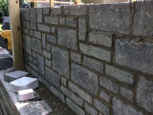 Before Outdoor Kitchen Wall Installation